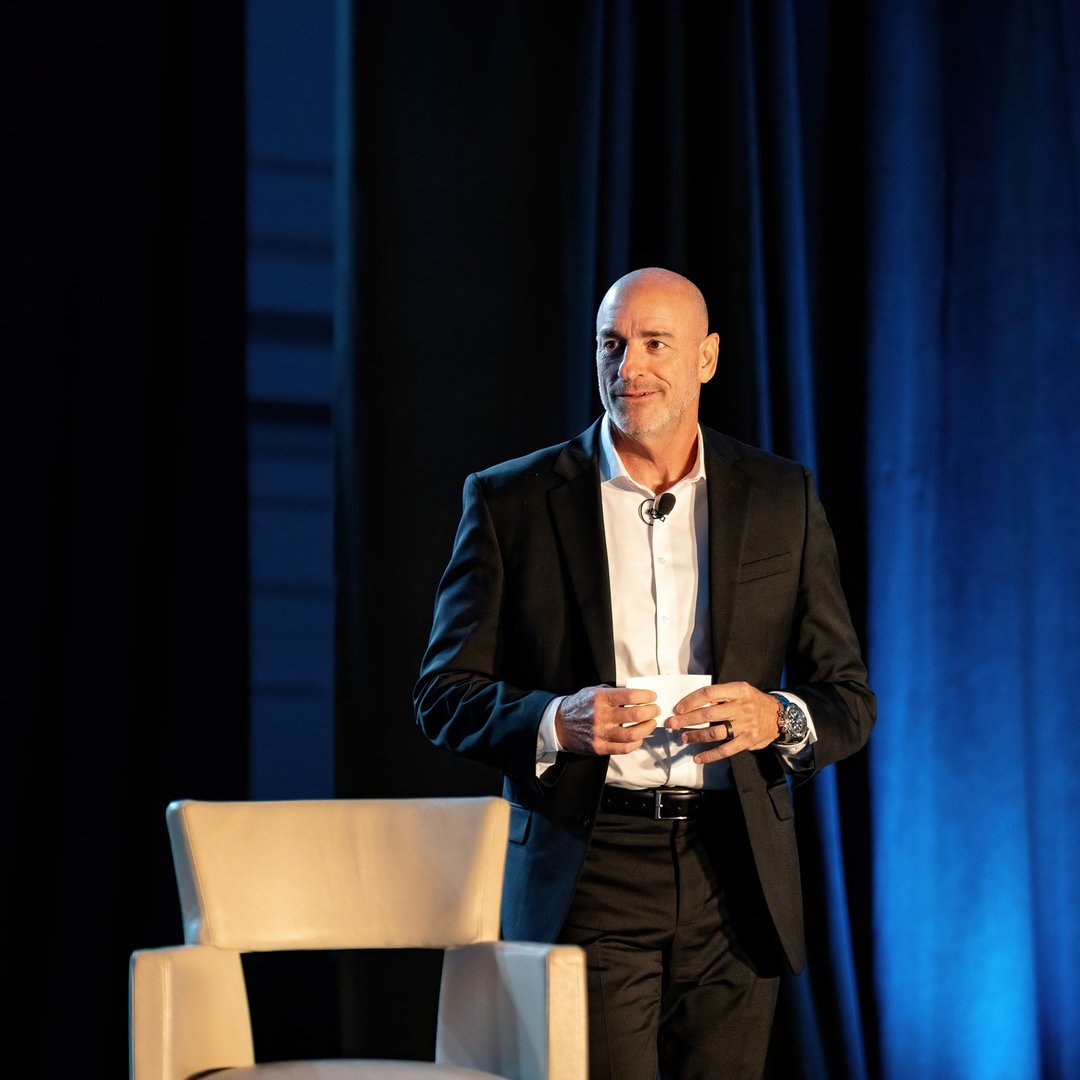 John Dessauer Speaking on Stage